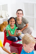 happy teacher and young students