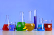 Laboratory Glassware Over Blue Background Laboratory Glassware Over Blue Background