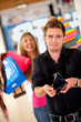 Shopping man with empty wallet