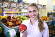 Woman shopping for fruits in the supermarket