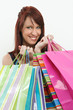 Redhead holding shopping bags