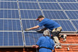 Photo: Workmen with new solar moduls Workmen with new solar moduls