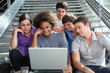 Group of college students with laptop computer Group of college students with laptop computer