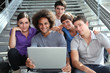 Group of college students with laptop computer Group of college students with laptop computer