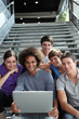 Group of college students with laptop computer Group of college students with laptop computer