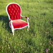 dreamlike scene armchair on a meadow