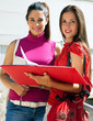 Female college friends talking on campus Female college friends talking on campus