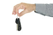 Hand holding car key