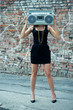 Woman with boom box head