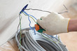 worker puts the wires