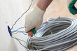worker puts the wires