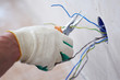 worker puts the wires