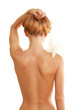 back of nude beautiful girl with flower