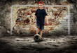 Football player and Grunge ball on the retro grunge background Football player and Grunge ball on the retro grunge background