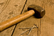hammer and nails on a workbench