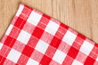checkered tablecloth on wooden table