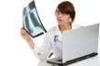 Doctor examining an x-ray image Doctor examining an x-ray image