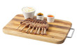 meat and sause on a cutting bard meat and sause on a cutting bard