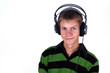 attractive guy with headphones on his head smiling to you