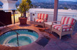 sitting by the spa at dusk