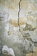 Grunge damaged wall with crack