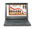 Foto: laptop with decrease diagram and abacus laptop with decrease diagram and abacus