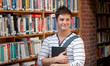 Attractive man holding a book Attractive man holding a book