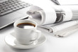 Cup of fragrant coffee on a morning paper business news