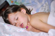 Girl sleeping in the bed