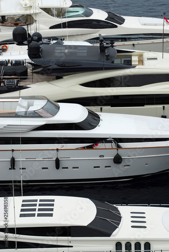Photo: Luxury yachts docked in Monte Carlo Luxury yachts docked in Monte Carlo