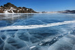 Surface of transparent fissured black ice of frozen lake Surface of transparent fissured black ice of frozen lake