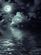 Photo: moon with nightly clouds over the water moon with nightly clouds over the water