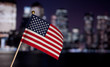 American toy flag over night Down Town Manhattan.