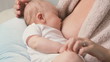 Mother nursing baby