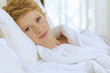 young woman in bed