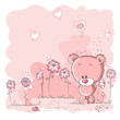 Pink cute bear holding a flower