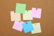 Empty note paper attched to cork board.