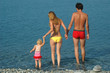 Family have fun on the beach Family have fun on the beach