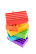 Childen bright multicoloured plasticine in the column  isolated