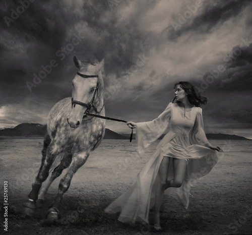 Photo: Fine art photo of a young beauty running with a horse Fine art photo of a young beauty running with a horse