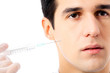 Man with syringe, isolated on white