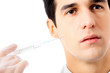 Man with syringe, isolated on white