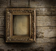 Old frame against a peeling painted wall Old frame against a peeling painted wall