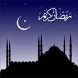 silhouette of mosques with Ramadan greetings in Arabic script