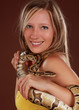 woman holding a snake woman holding a snake