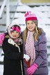 Photo: Portrait Of Two Girls In Winter Clothes Portrait Of Two Girls In Winter Clothes