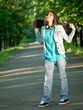 Foto: Teenage girl with skateboard Teenage girl with skateboard
