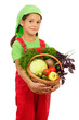 Little girl with basket of vegetables, isolated on white