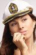 Sexy beautiful woman captain cap isolated Sexy beautiful woman captain cap isolated