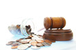 court gavel and coin jar, on white - lawsuit or divorce concept